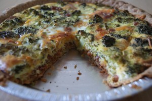 Bacon ranch quiche topped with broccoli ready to be served.