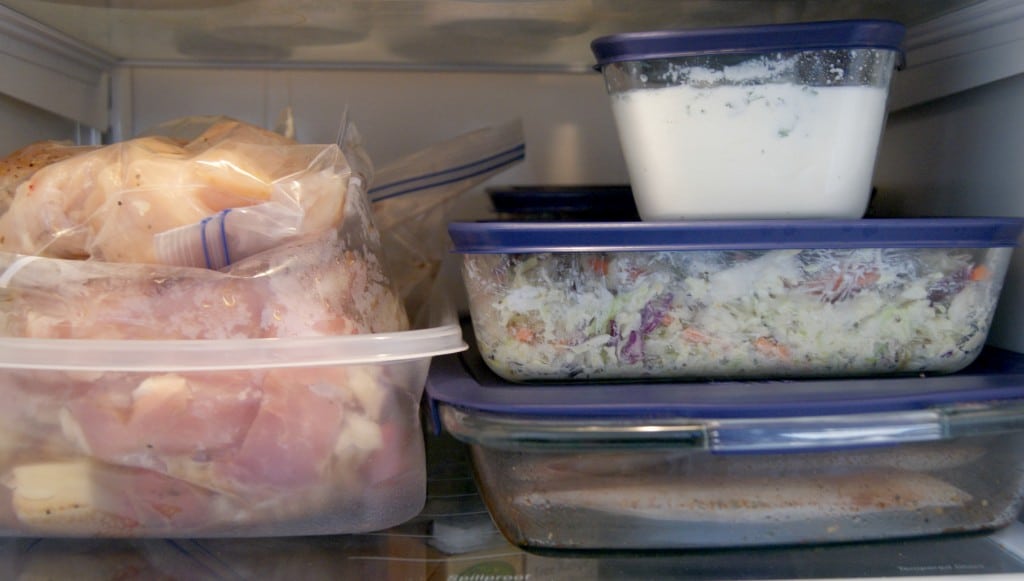5 dinners and meals prepared and stored in containers in the refrigerator