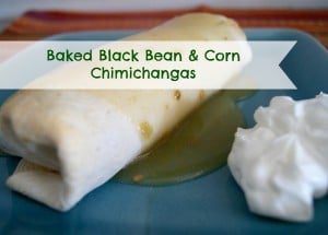 One Black bean Chimichanga served with a scoop of sour cream on a plate.