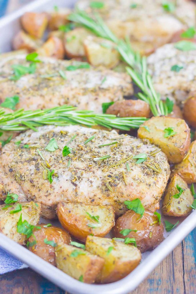 Sheet pan rosemary herb roasted pork chops and potatoes